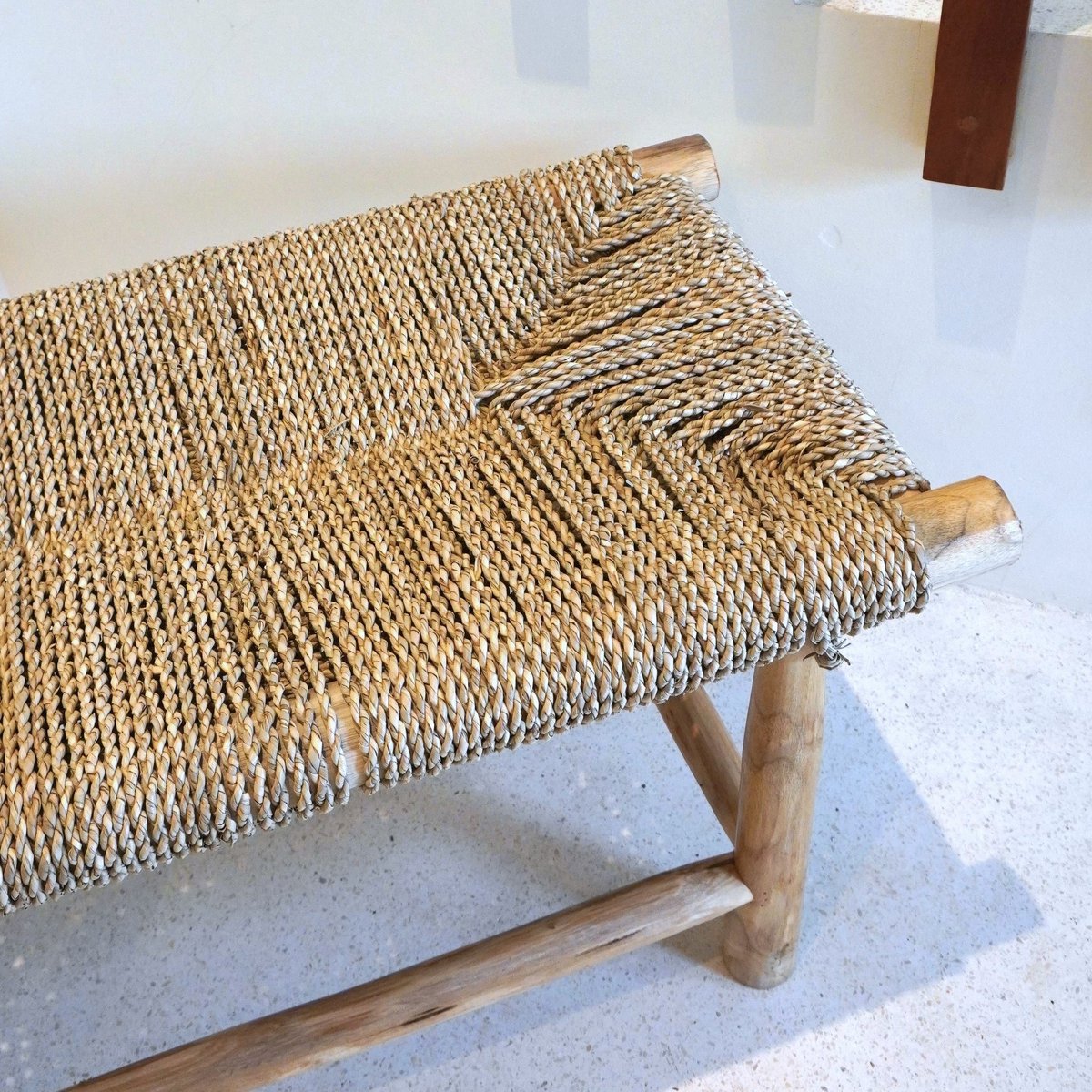 SUNGAI sofa made of solid wood with a seat made of woven seagrass